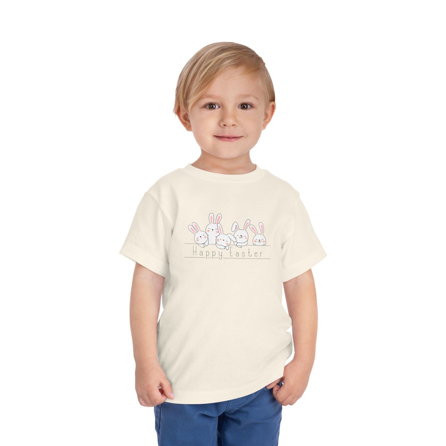 Toddler wearing "Happy Easter" natural t-shirt with fluffy bunnies design