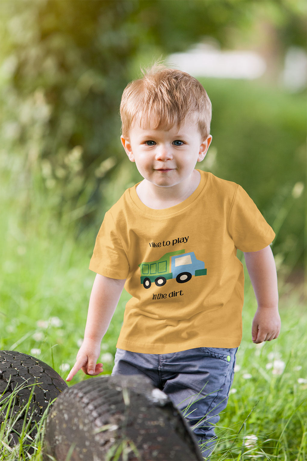 Little boy wearing I Like to play in dirt truck- toddler tee -Heather Yellow Gold