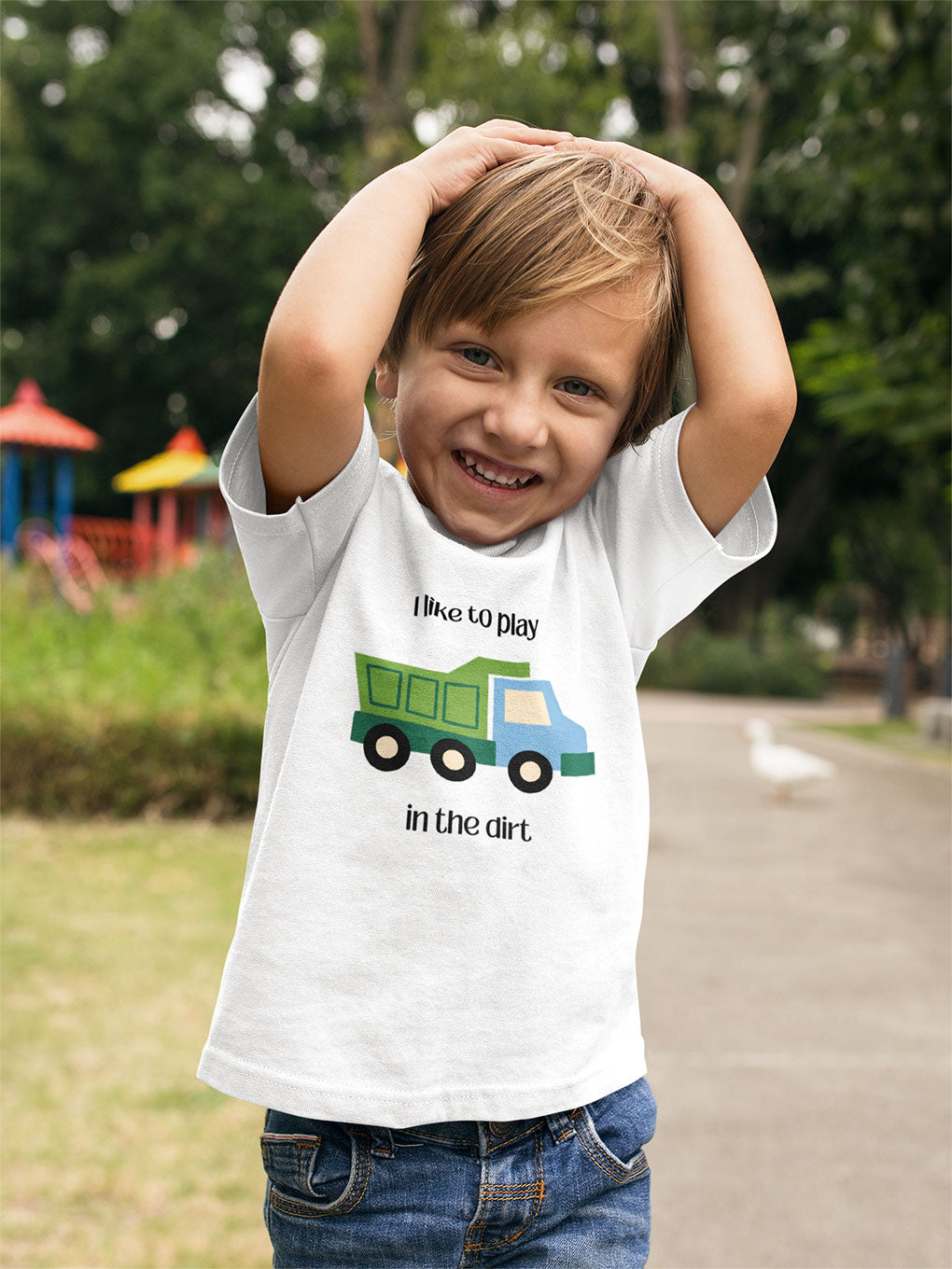Little boy wearing I Like to play in dirt truck- toddler tee -White