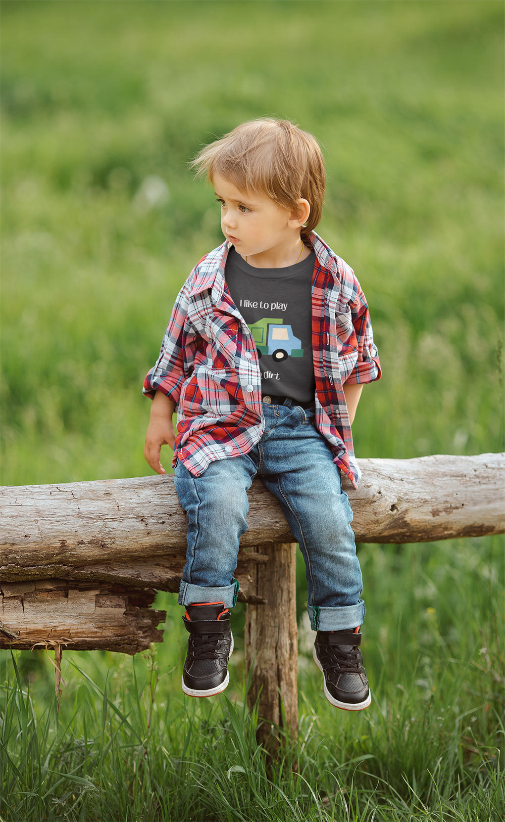 boy on rustic fence wearing I Like to play in dirt truck- toddler tee - Asphalt
