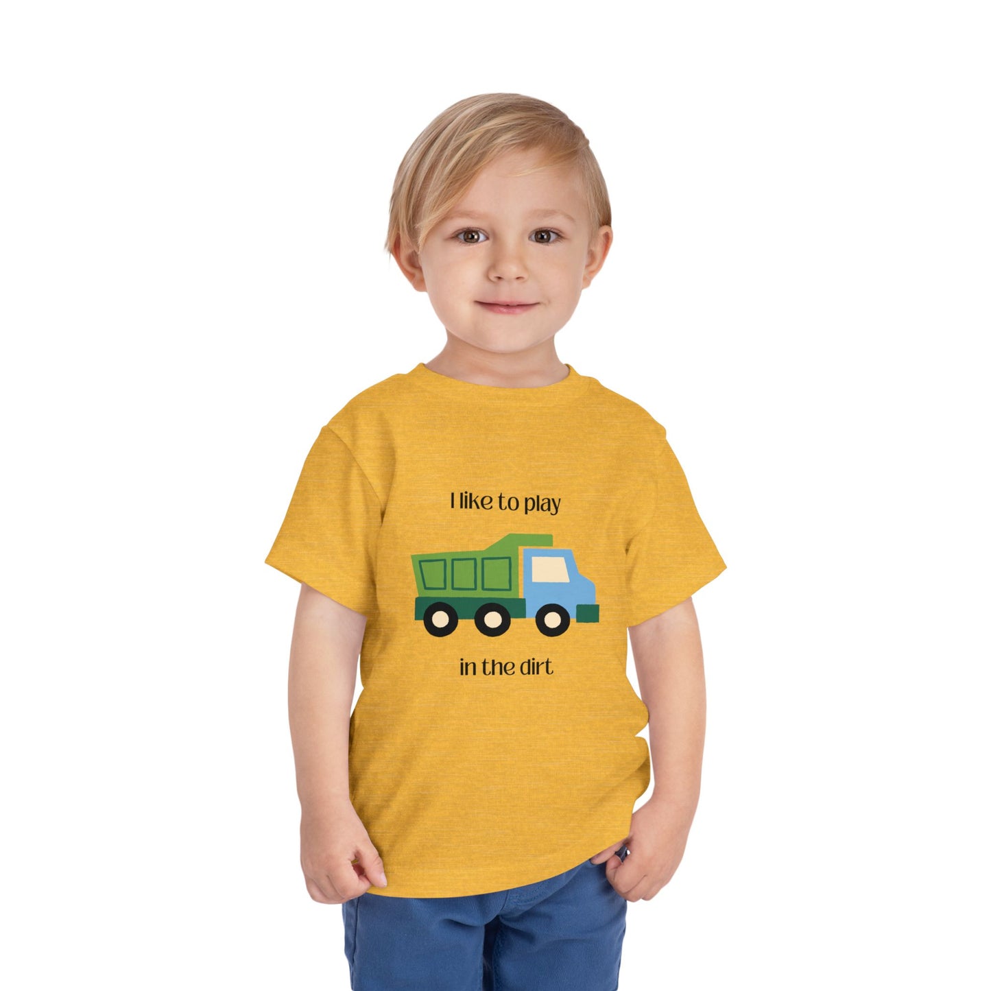 model wearing I Like to play in dirt truck- toddler tee -Heather Yellow Gold
