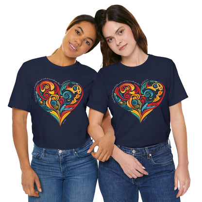 2 friends wearing unisex t-shirt with Stella Adler quote and heart swirl design on hanger- navy