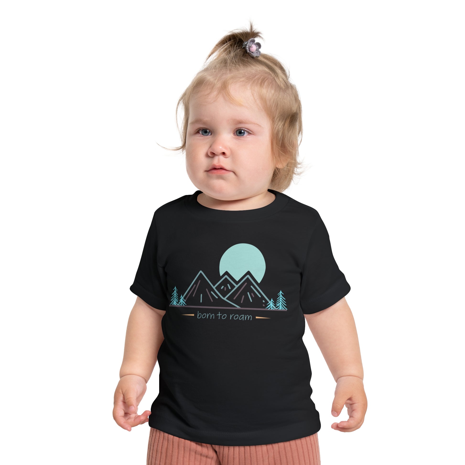 Front pose of baby wearing t-shirt saying "Born to Roam"- black