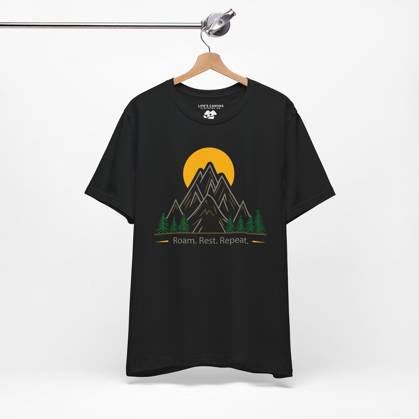 Black Roam Rest Repeat minimalist unisex tee on hanger