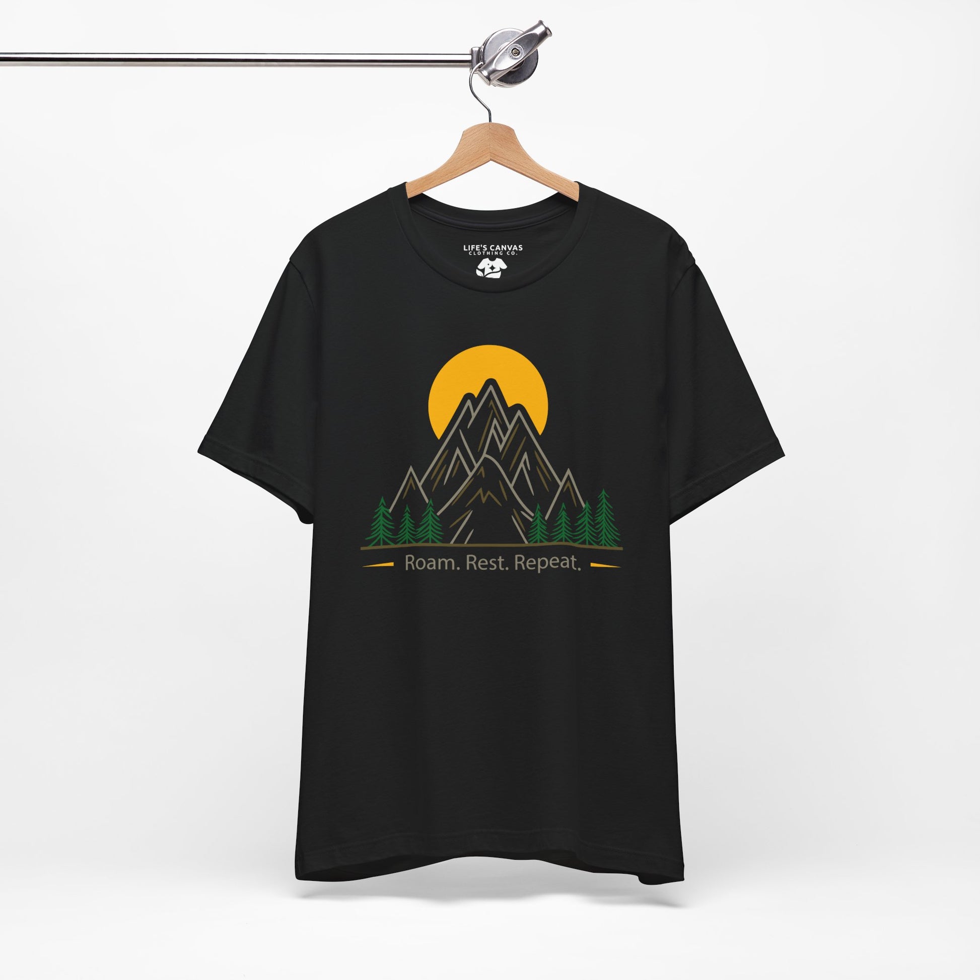 Black Roam Rest Repeat minimalist unisex tee on hanger