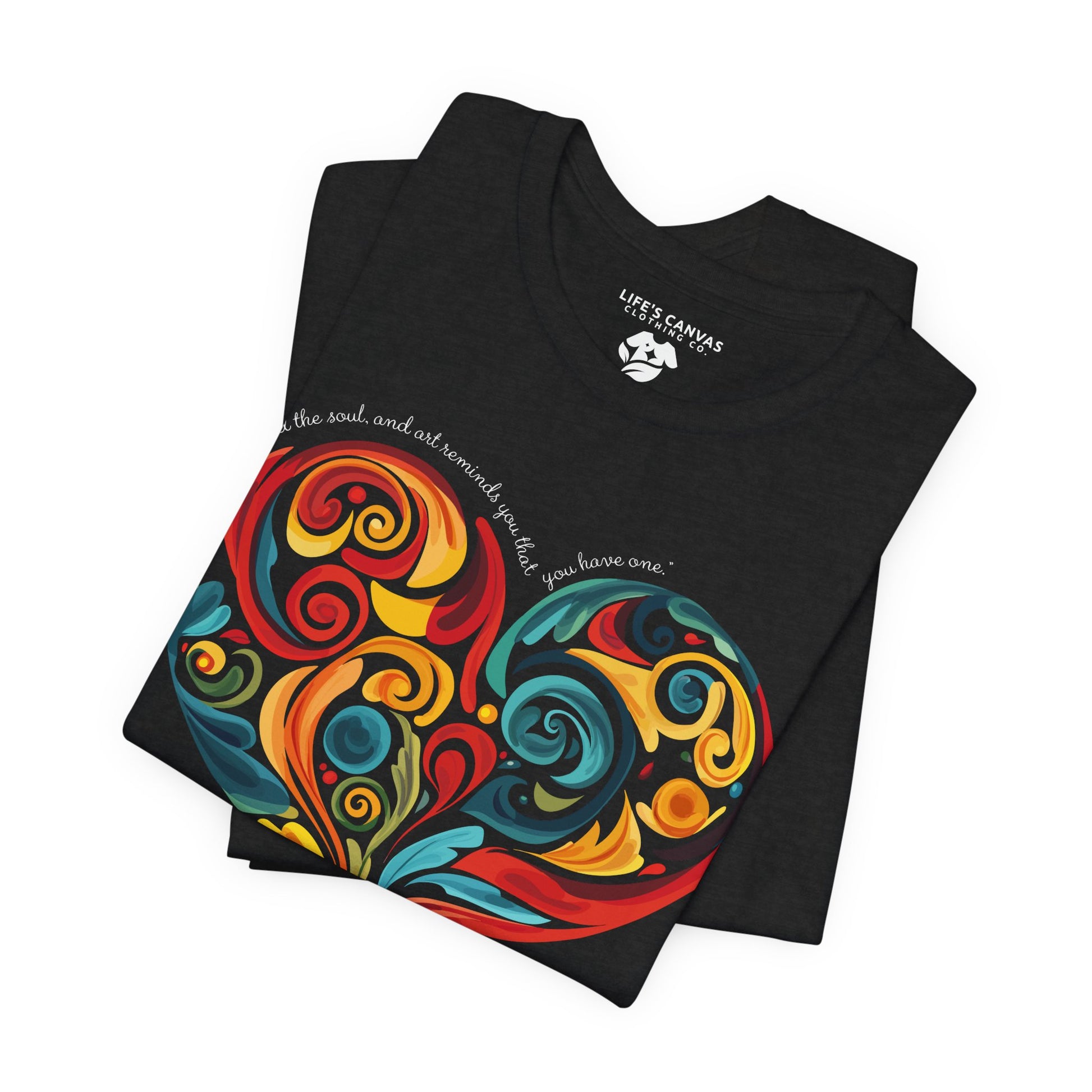 Close-up of colorful heart design on black t-shirt