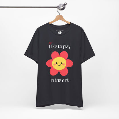 Dark grey t-shirt on a hanger with a  pink flower- I still like to play in the dirt