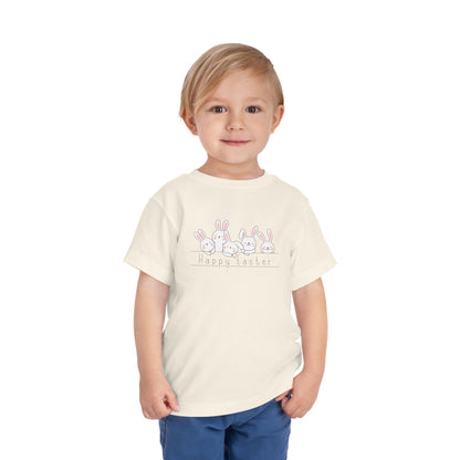 Toddler wearing "Happy Easter" natural t-shirt with fluffy  bunnies design