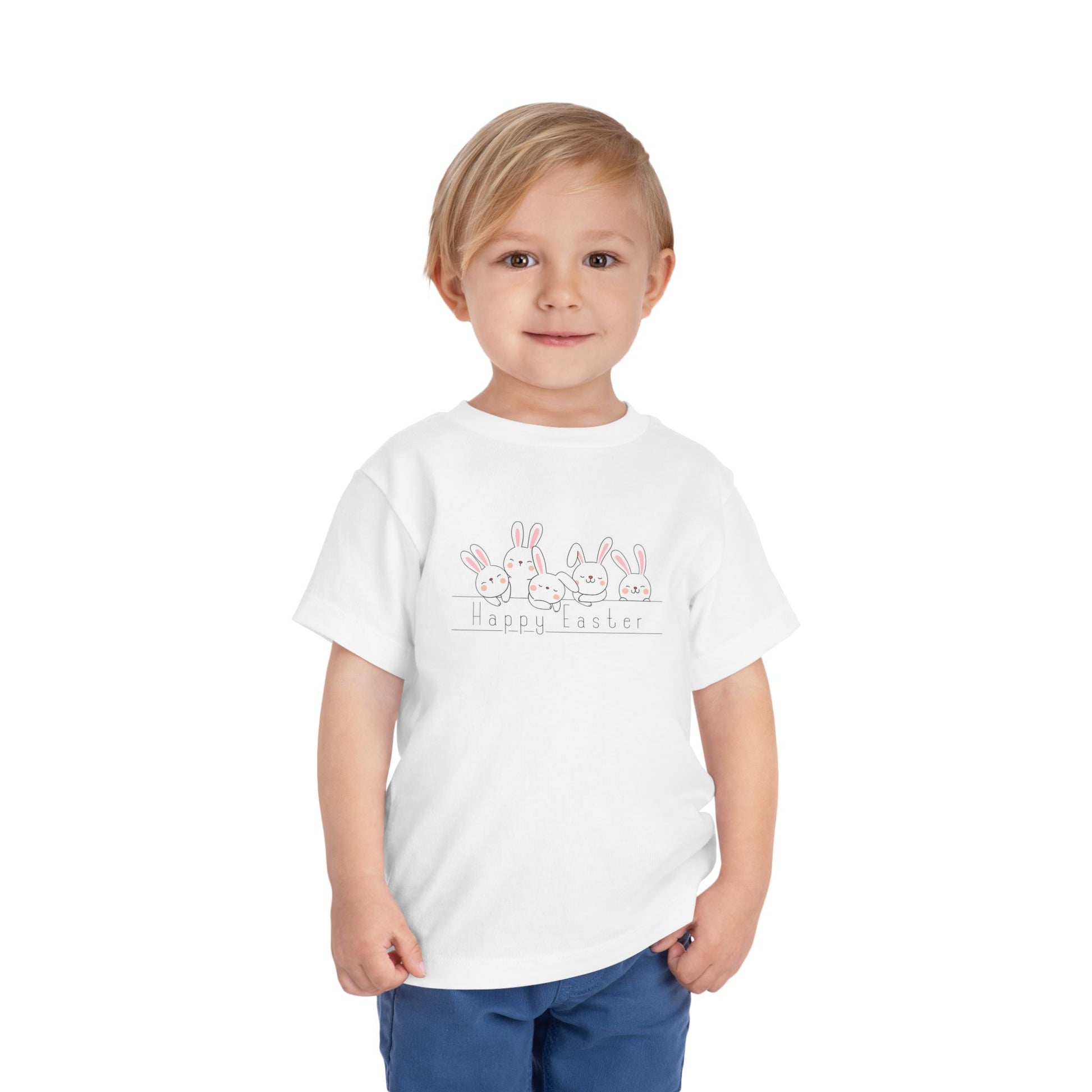 Toddler wearing "Happy Easter"  white t-shirt with fluffy  bunnies design
