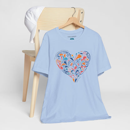 Kindness quote tee inspired by Mother Teresa hanging off a chair- Baby Blue