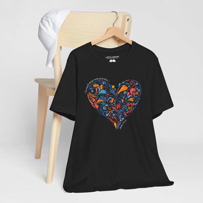  Kindness quote tee inspired by Mother Teresa hanging off a chair- Black