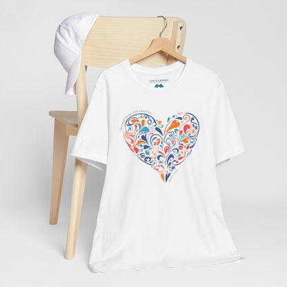  Kindness quote tee inspired by Mother Teresa hanging off a chair- White