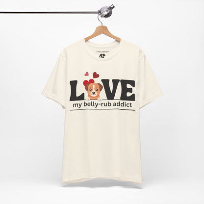 “LOVE My Belly-Rub Addict” t-shirt with puppy peeking out, on a hanger  in Natural