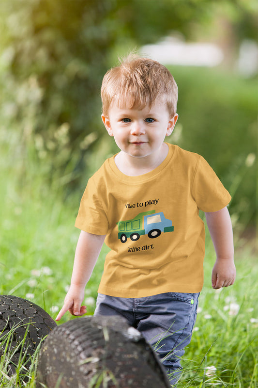 Little boy wearing I Like to  play in dirt truck- toddler tee -Heather Yellow Gold