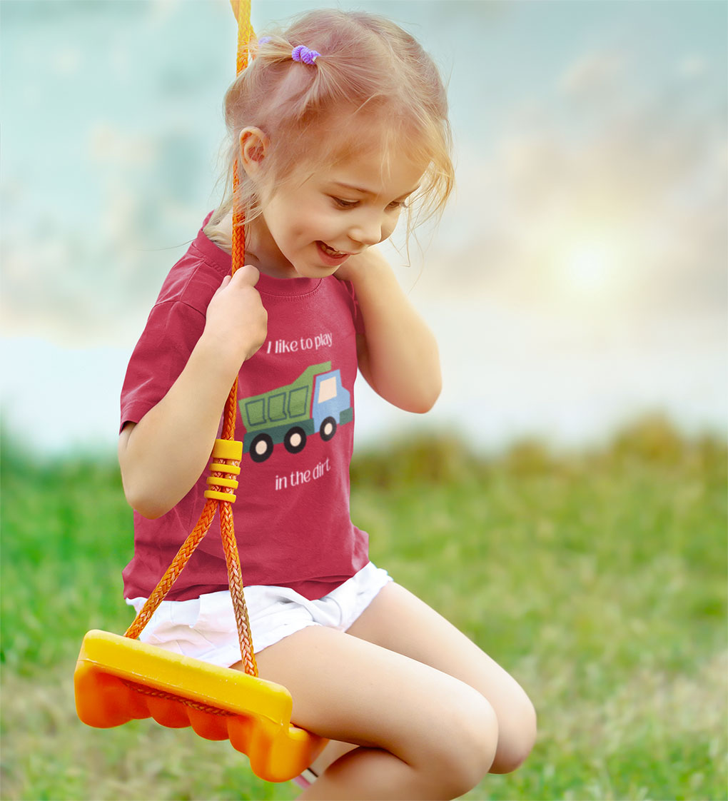 Little girl smiling on swing wearing I Like to  play in dirt truck- toddler tee - Heather Red