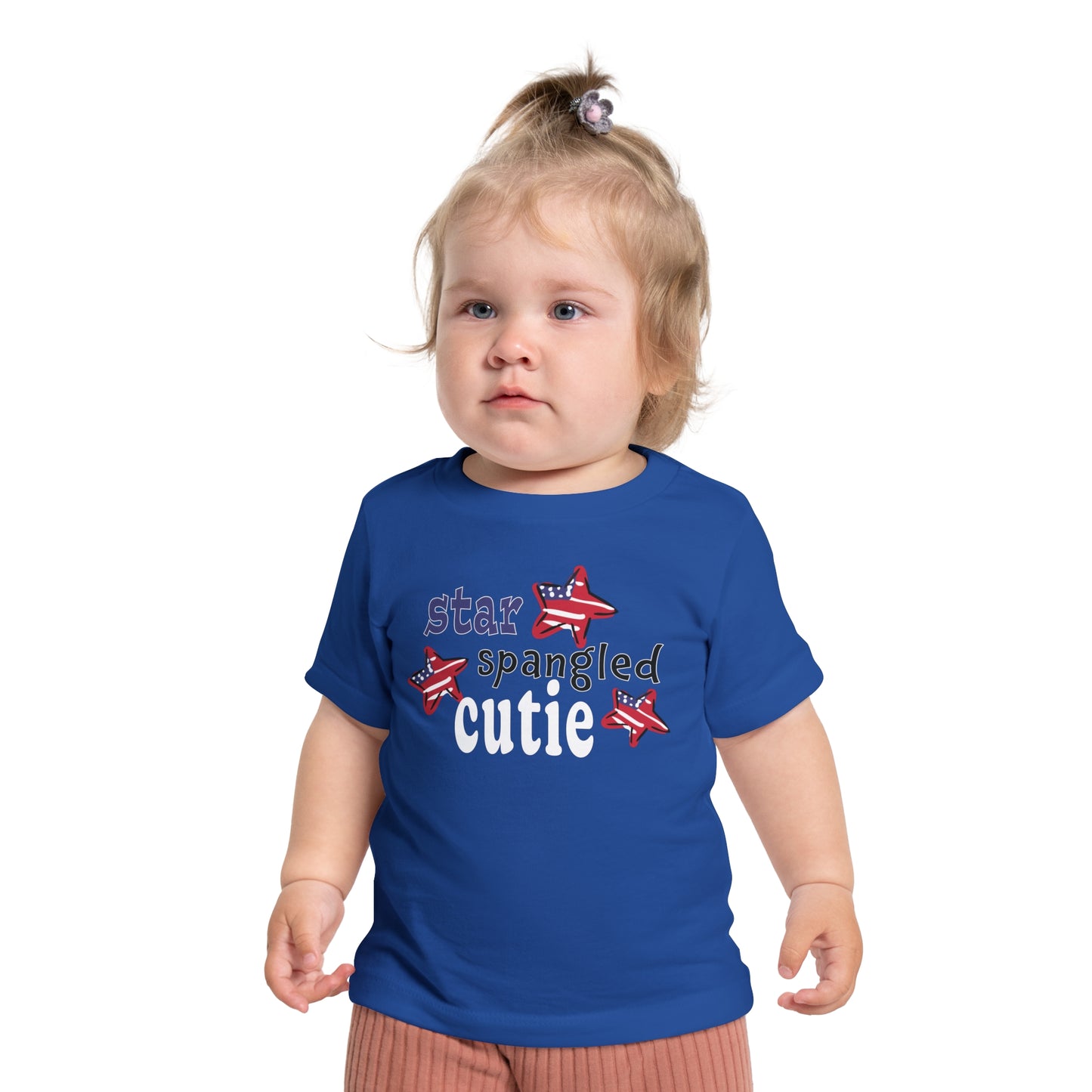 Baby wearing a True Royal blue t-shrit with typography and patriotic stars, t-shirt says "star spangled cutie"