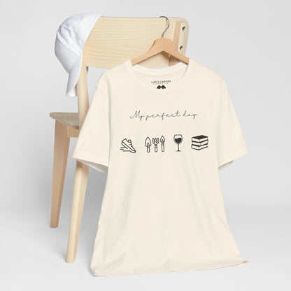 Unisex shirt with jog, garden, wine, and book icons on a hanger in natural