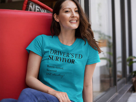 Parent wearing turquoise survivor tee post driving lesson
