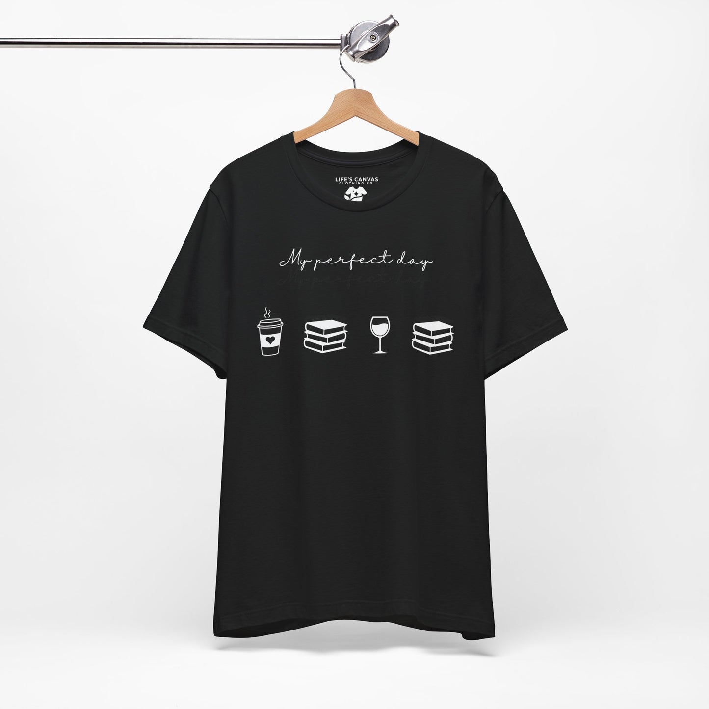 Perfect day shirt for book lovers and introverts, coffee, wine, and books- hanging in black