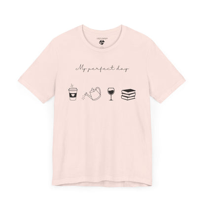 Soft Pink flat "My perfect day"  t-shirt with coffee, water can, wine, and book icons