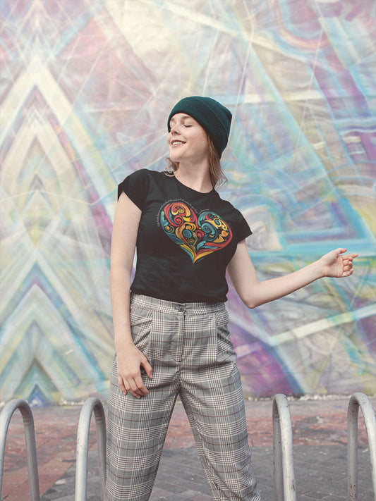Creative woman eyes closed taking in the moment outside while wearing Stella Adler quote and heart swirl design  t-shirt