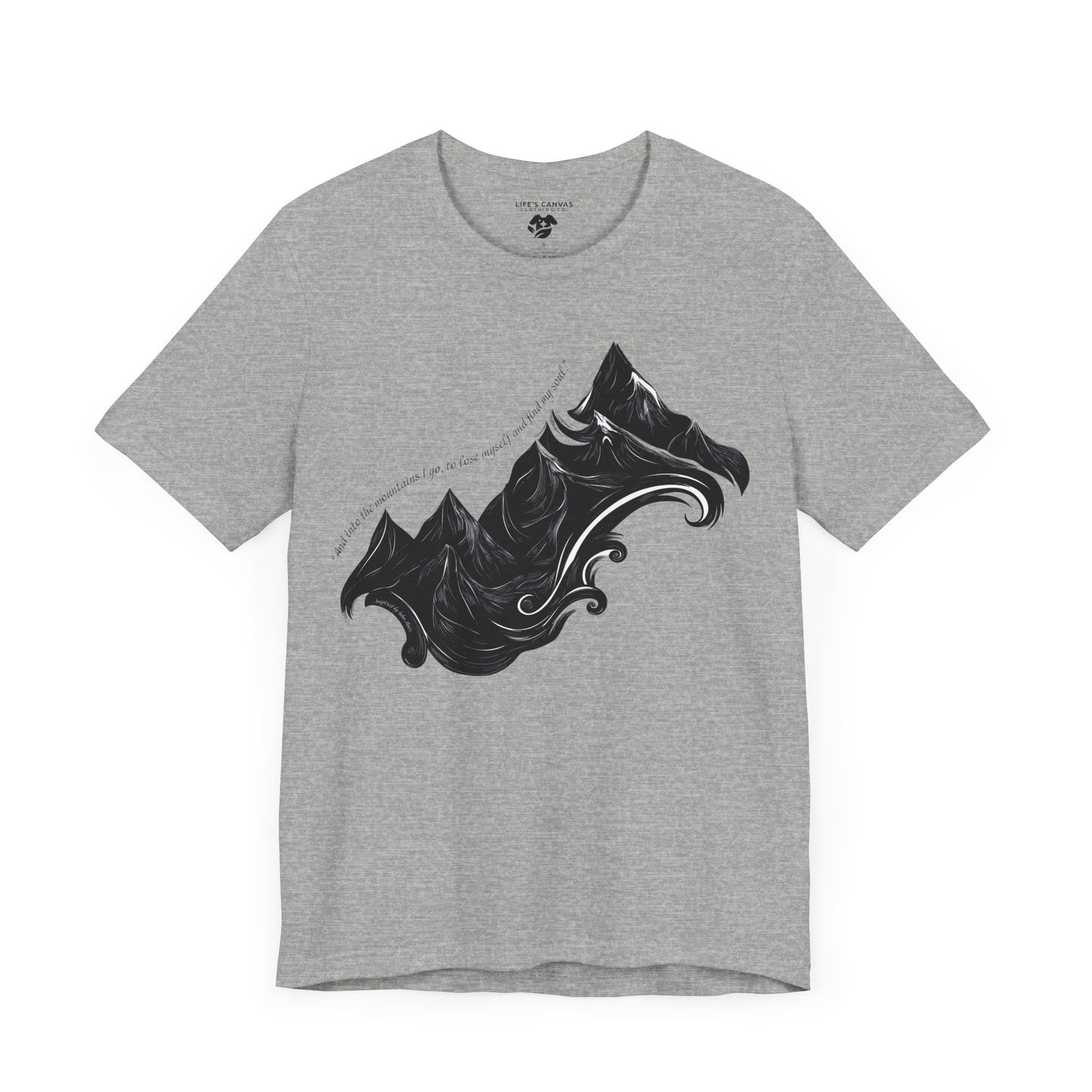 Unisex t-shirt with sketched mountain design and John Muir quote “Into the Mountains I go...”- Athletic Heather laying flat