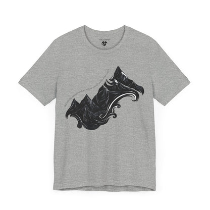Unisex t-shirt with sketched mountain design and John Muir quote “Into the Mountains I go...”- Athletic Heather laying flat