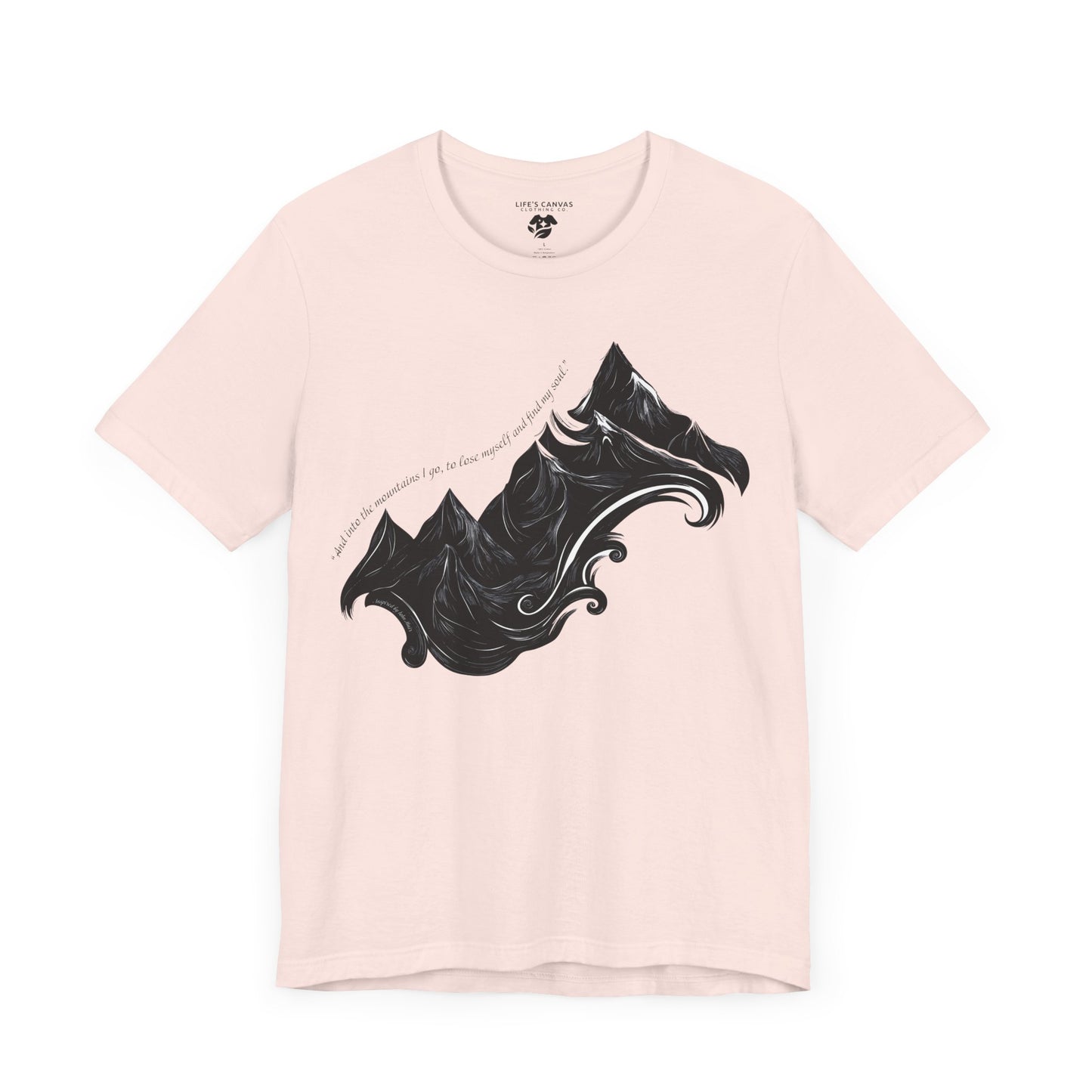 Unisex t-shirt with sketched mountain design and John Muir quote “Into the Mountains I go...”- Soft Pink laying flat