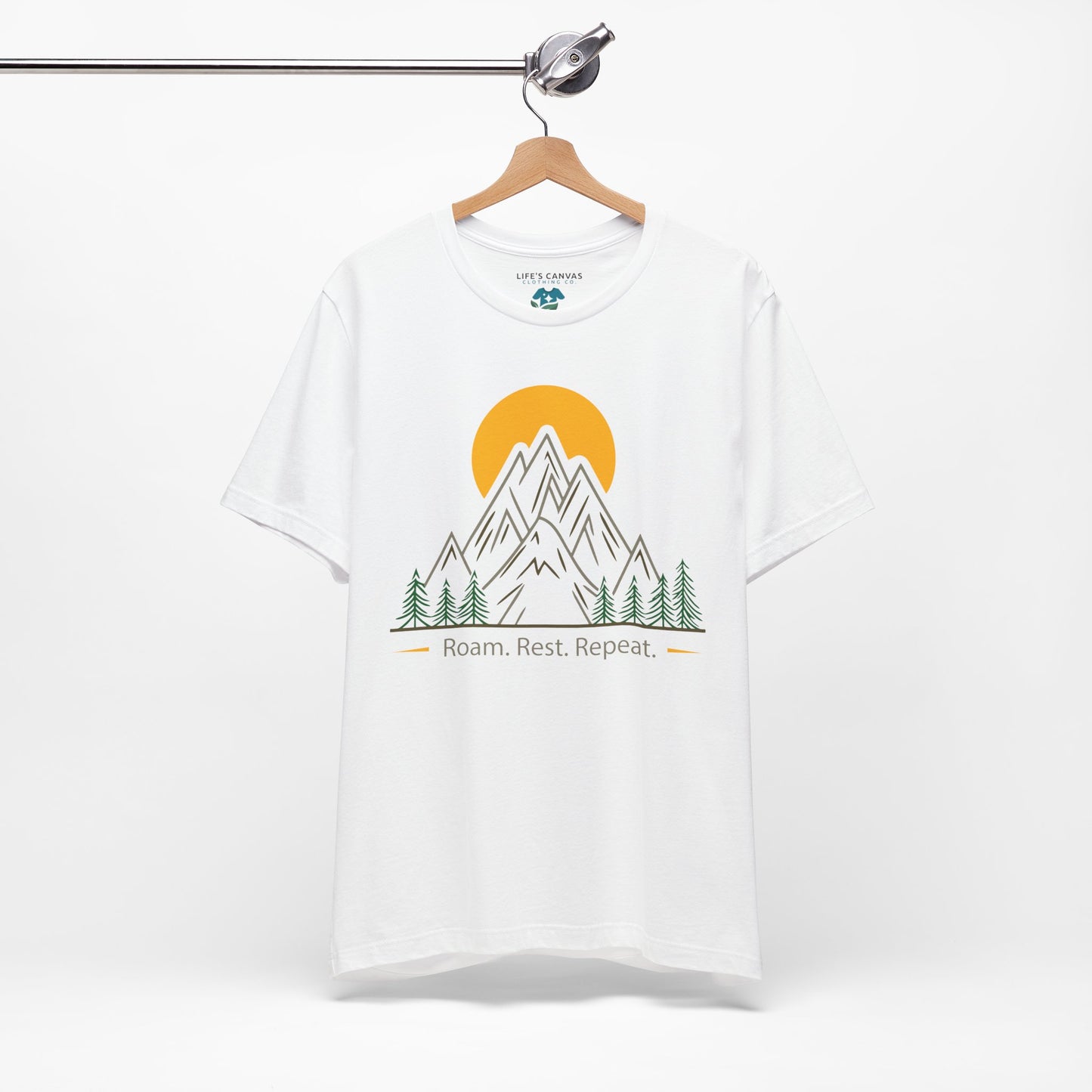 White Roam Rest Repeat minimalist unisex tee on hanger