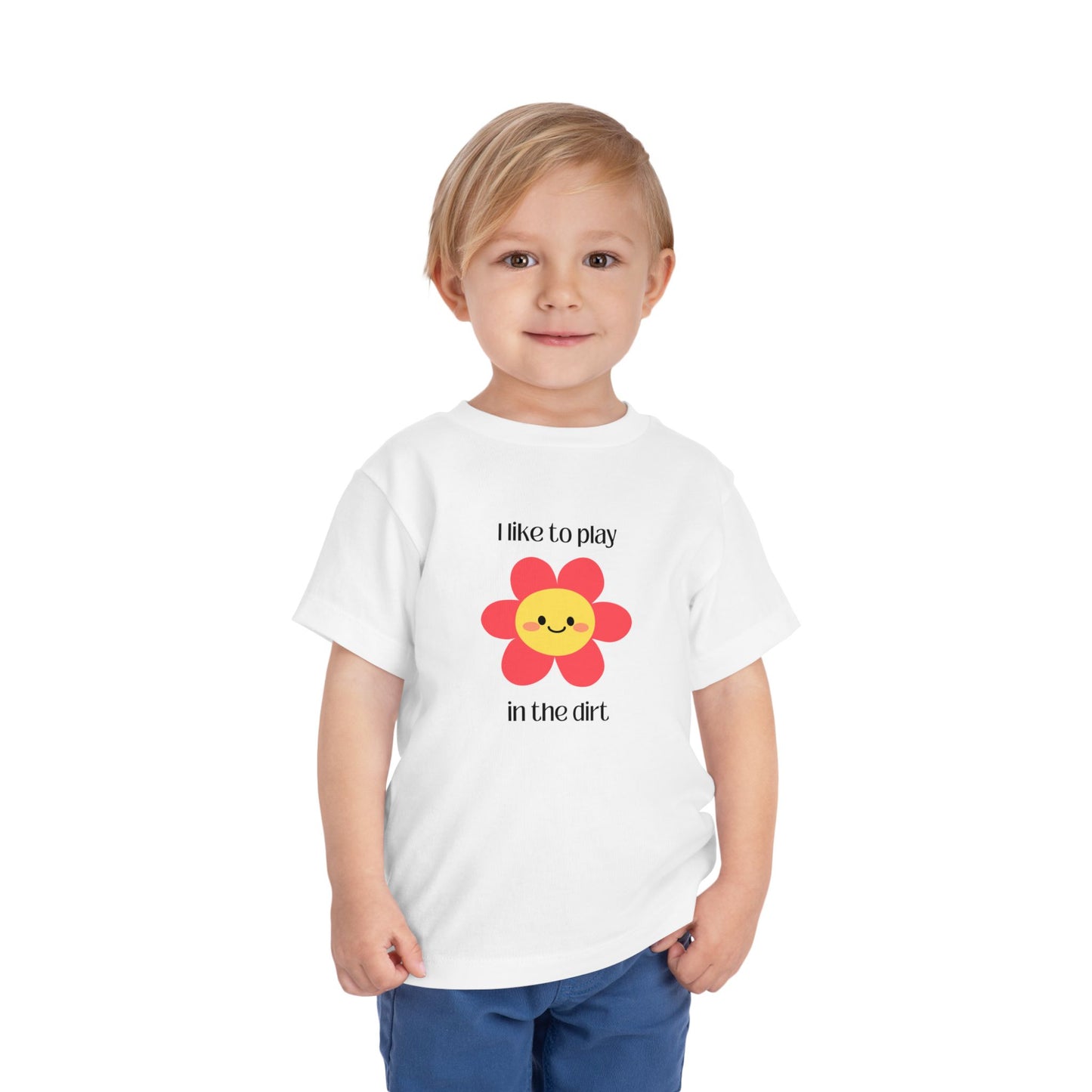 White toddler I like to play in the dirt flower tee with toddler posing