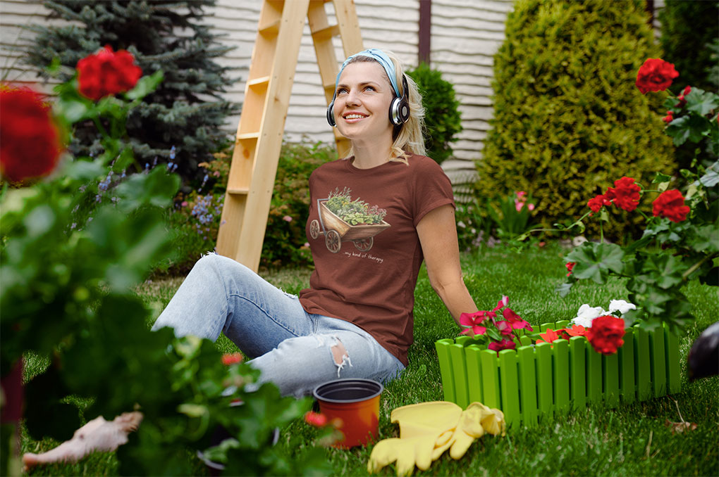 Woman in backyard. nature-inspired garden shirt for outdoor enthusiasts folded- Cardinal