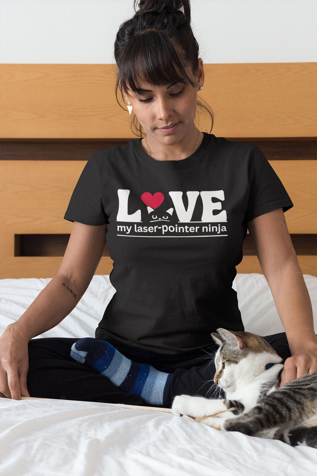 Woman petting her cat wearing a LOVE My Laser-Pointer Ninja Black colored shirt 