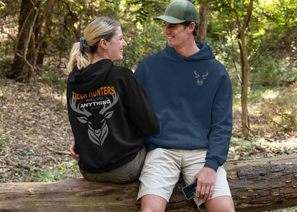 Couple sitting in woods wearing Deer Hunters will do anything for a buck hoodies