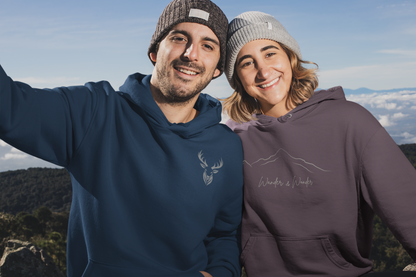 couple in mountain wearing blue deer hunter hoodie