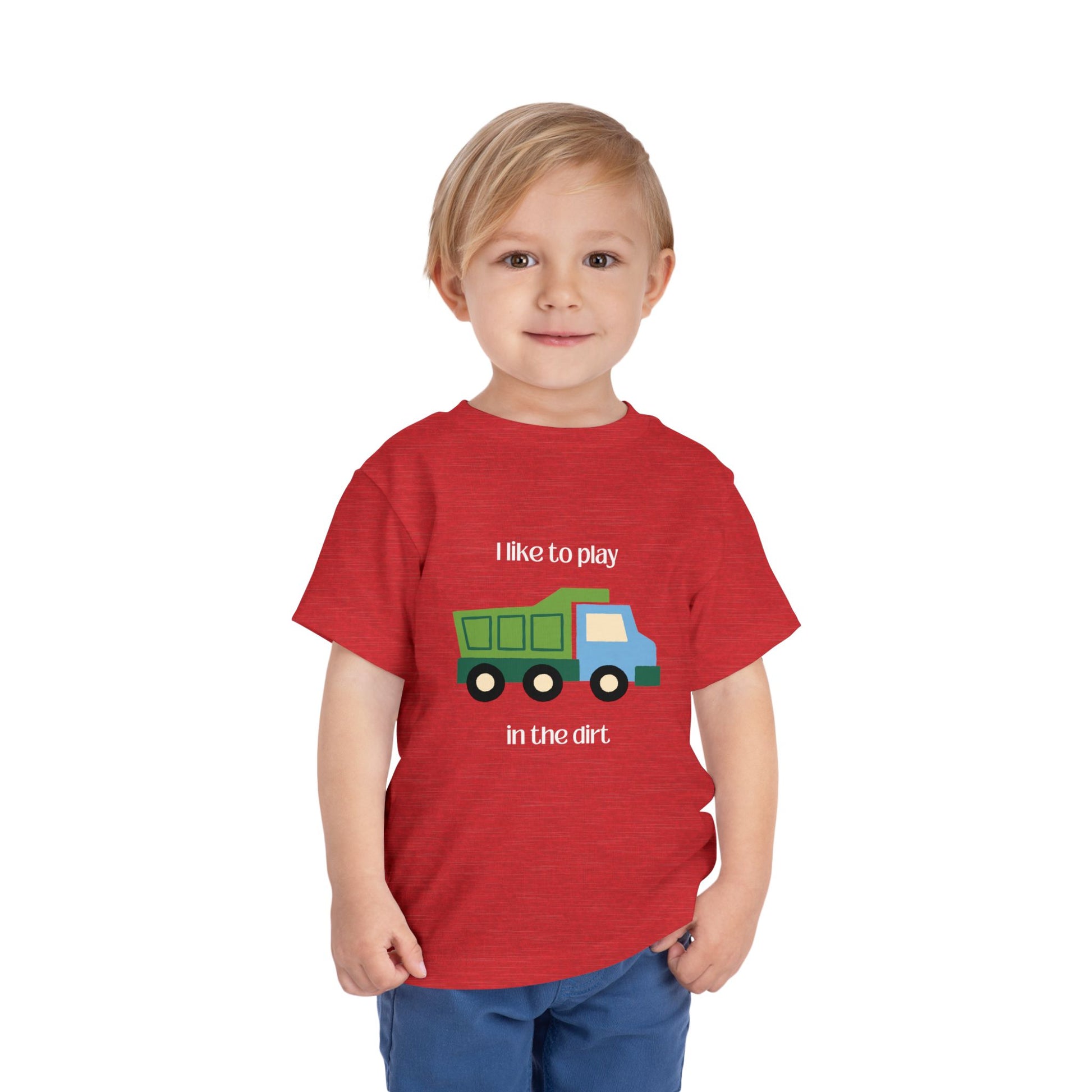 model wearing I Like to  play in dirt truck- toddler tee - Heather Red